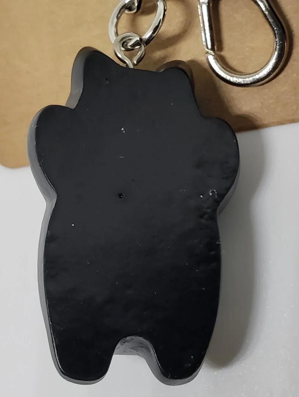 Handmade painted resin black cat paw keychain